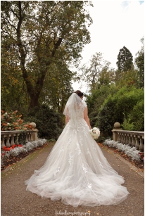 Back view of a beautiful wedding dress at Dewstow Gardens