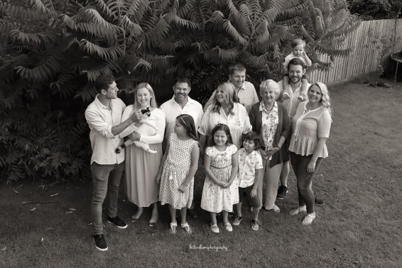black and white photo of large family group