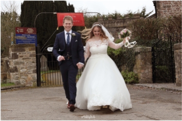 bride and groom just married St Thomas Church Redwick