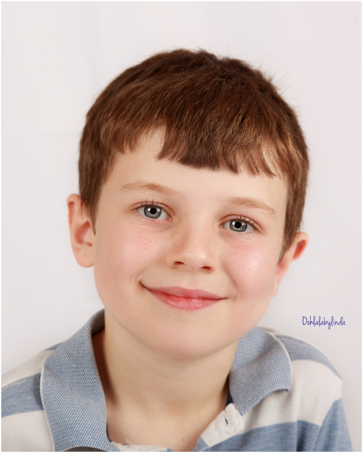 Head and shoulders portrait of little boy