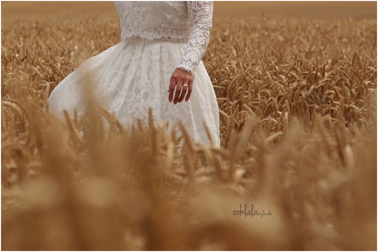 bride walking through cornfield